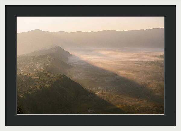 Mountain Shadow Stretching Across Valley