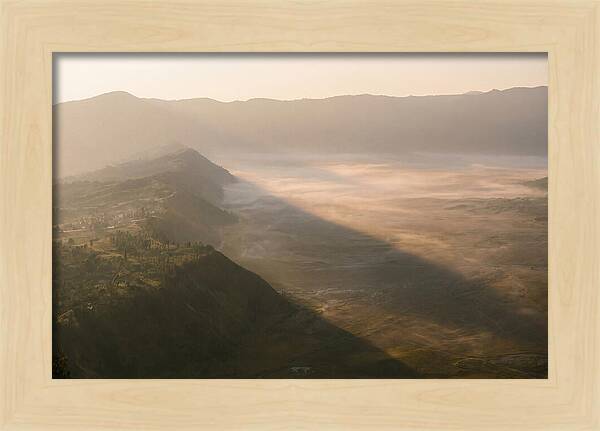 Mountain Shadow Stretching Across Valley