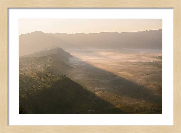 Mountain Shadow Stretching Across Valley