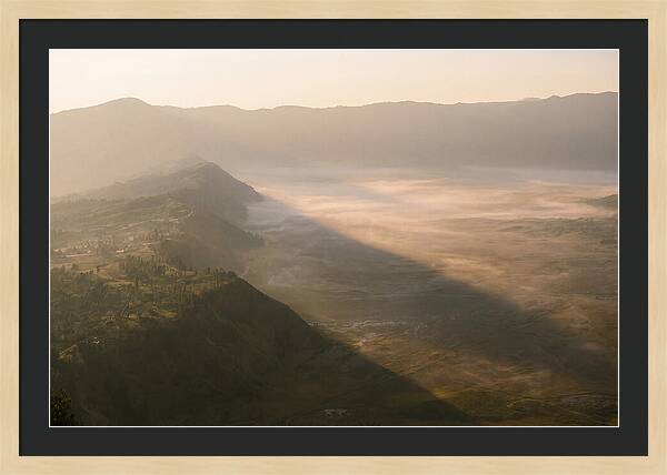 Mountain Shadow Stretching Across Valley