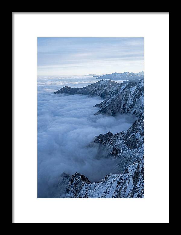Mountain Sunrise Above Clouds