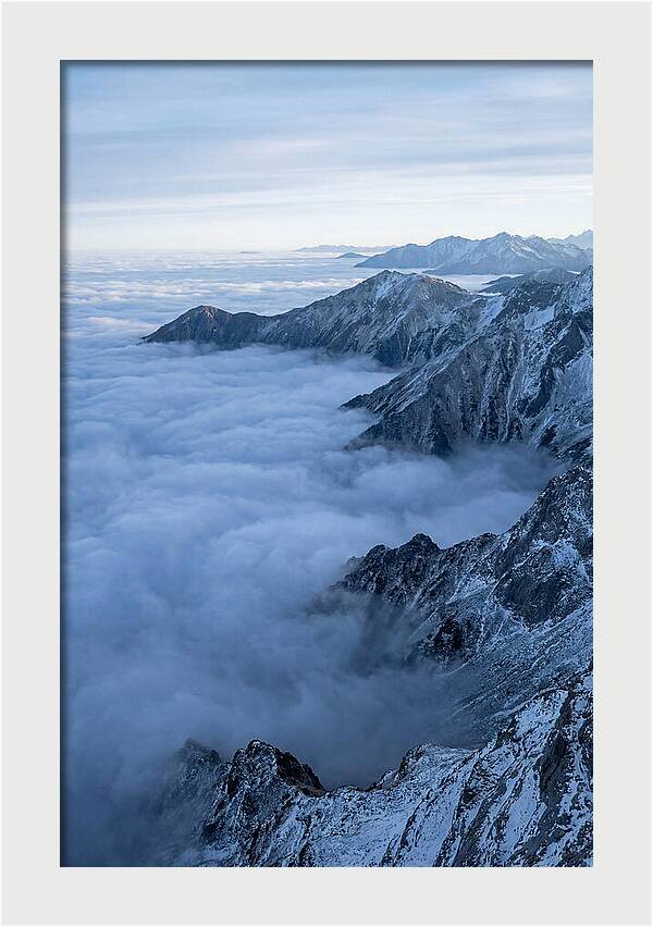 Mountain Sunrise Above Clouds