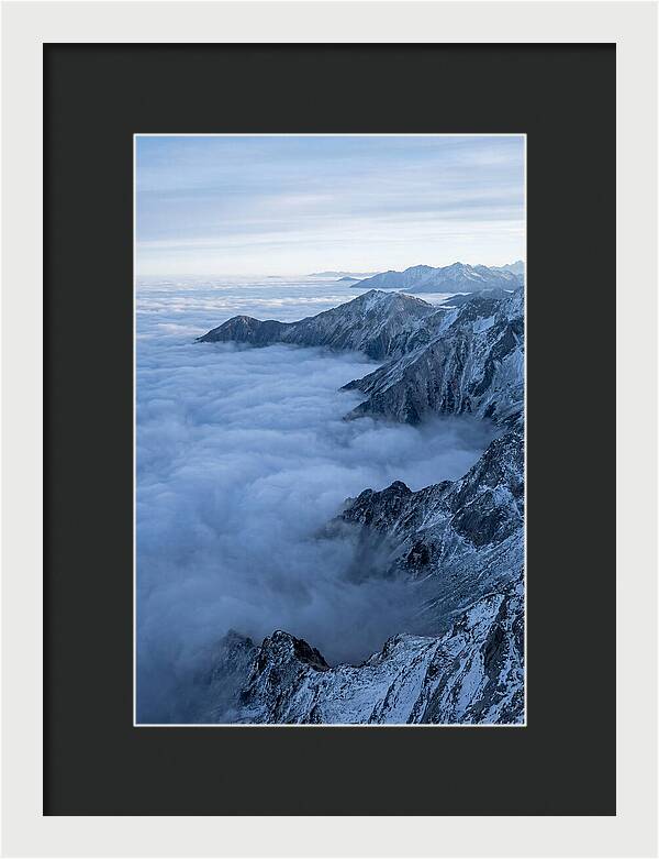 Mountain Sunrise Above Clouds