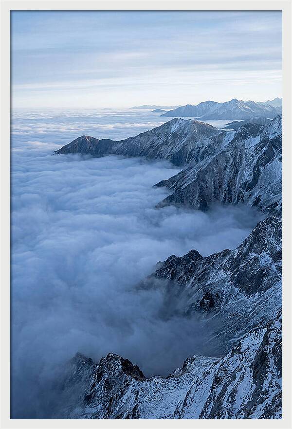 Mountain Sunrise Above Clouds