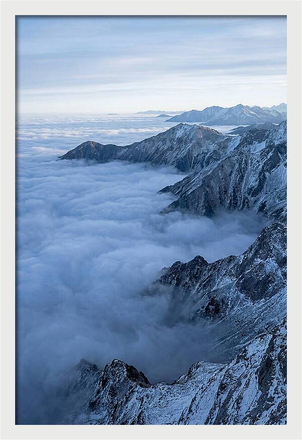 Mountain Sunrise Above Clouds