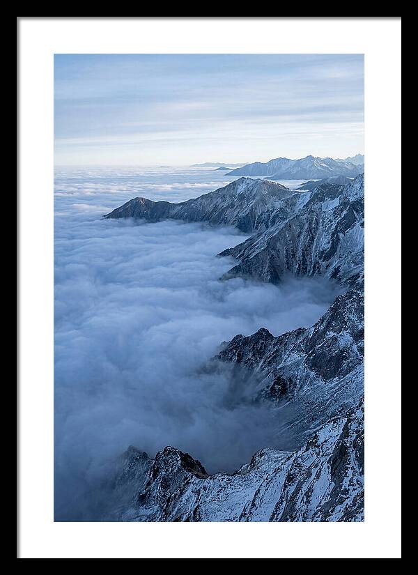 Mountain Sunrise Above Clouds