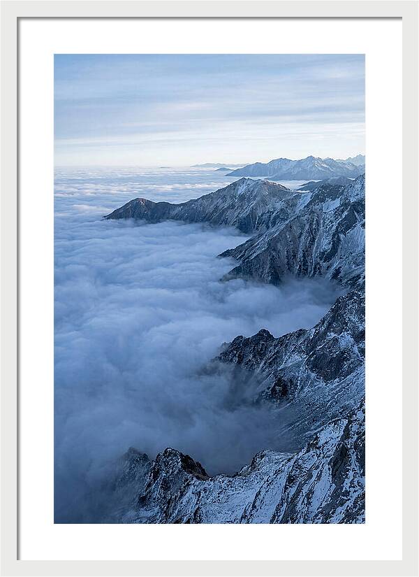 Mountain Sunrise Above Clouds