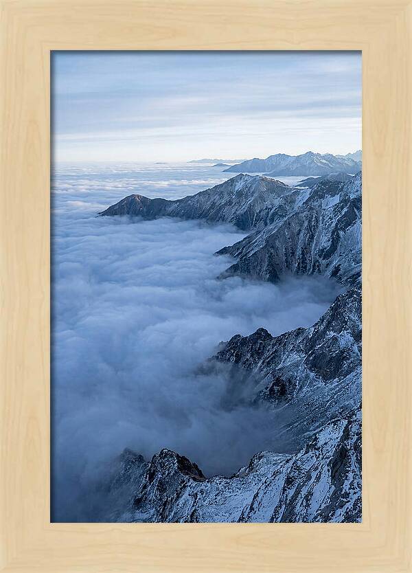 Mountain Sunrise Above Clouds