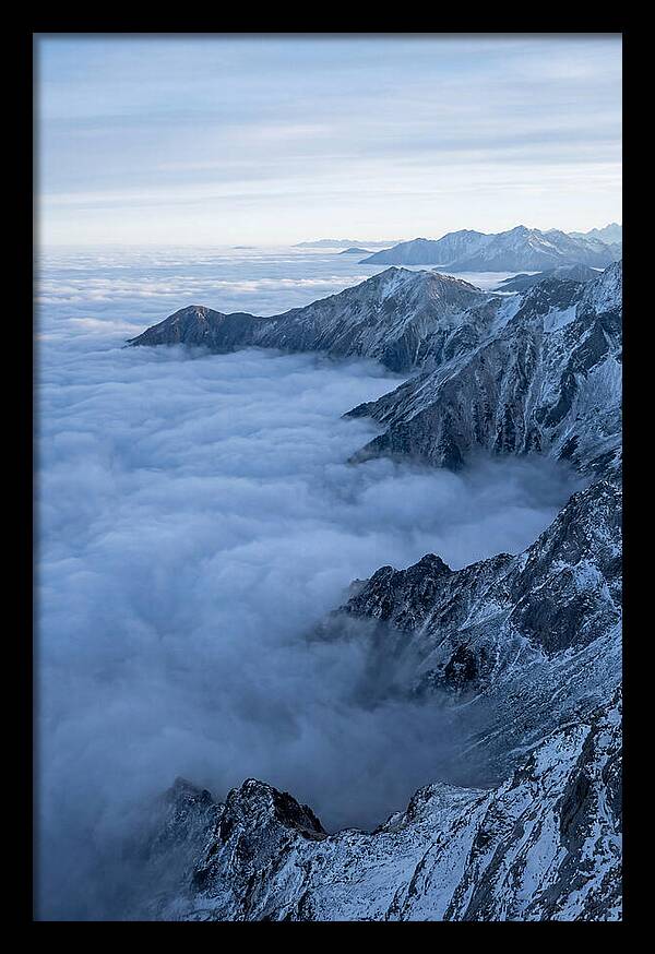 Mountain Sunrise Above Clouds