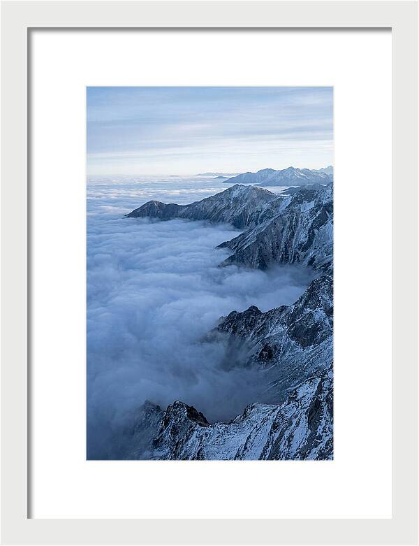 Mountain Sunrise Above Clouds