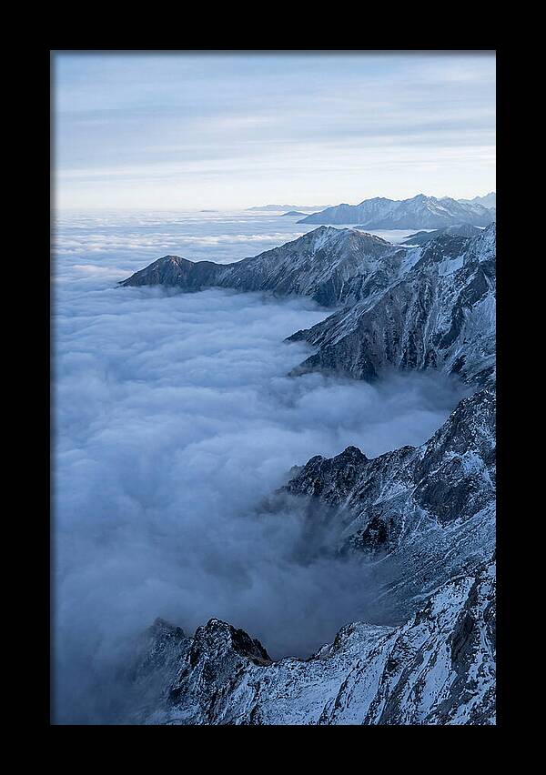 Mountain Sunrise Above Clouds