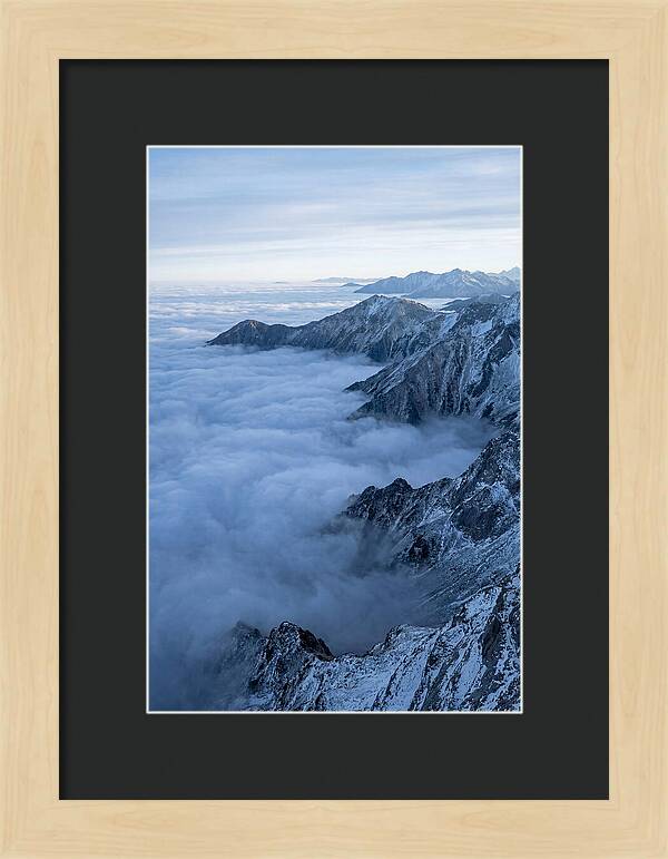 Mountain Sunrise Above Clouds