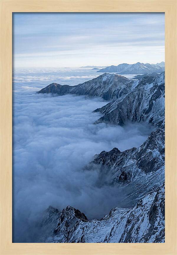 Mountain Sunrise Above Clouds