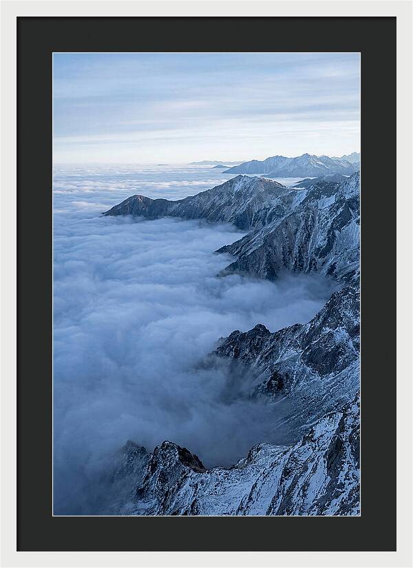 Mountain Sunrise Above Clouds