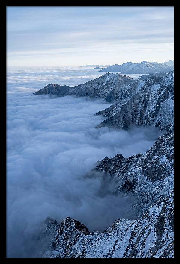 Mountain Sunrise Above Clouds