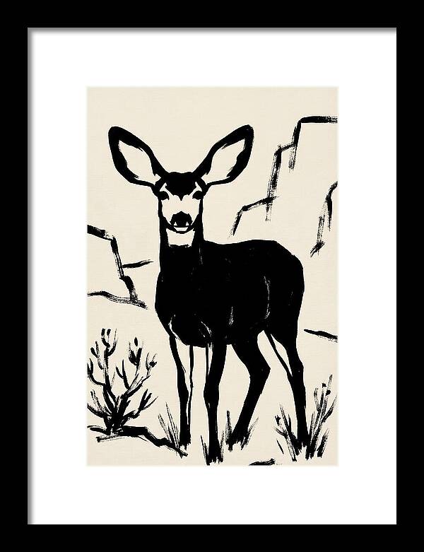 Mule Deer Silhouette Against Rocks
