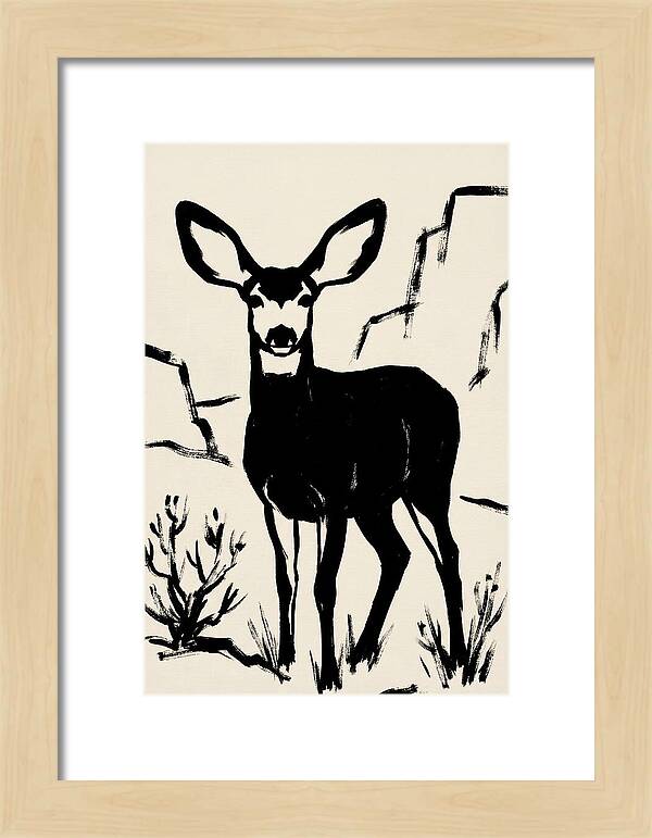 Mule Deer Silhouette Against Rocks