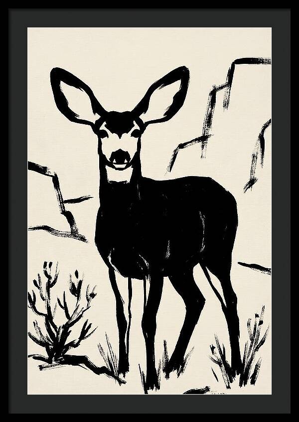 Mule Deer Silhouette Against Rocks