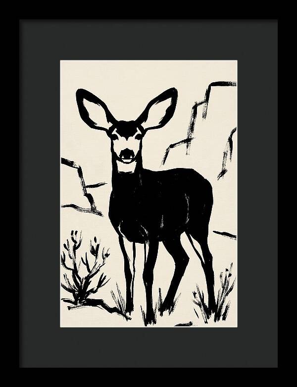 Mule Deer Silhouette Against Rocks