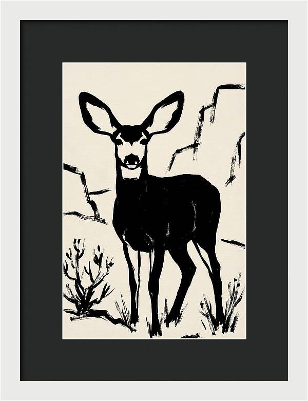 Mule Deer Silhouette Against Rocks