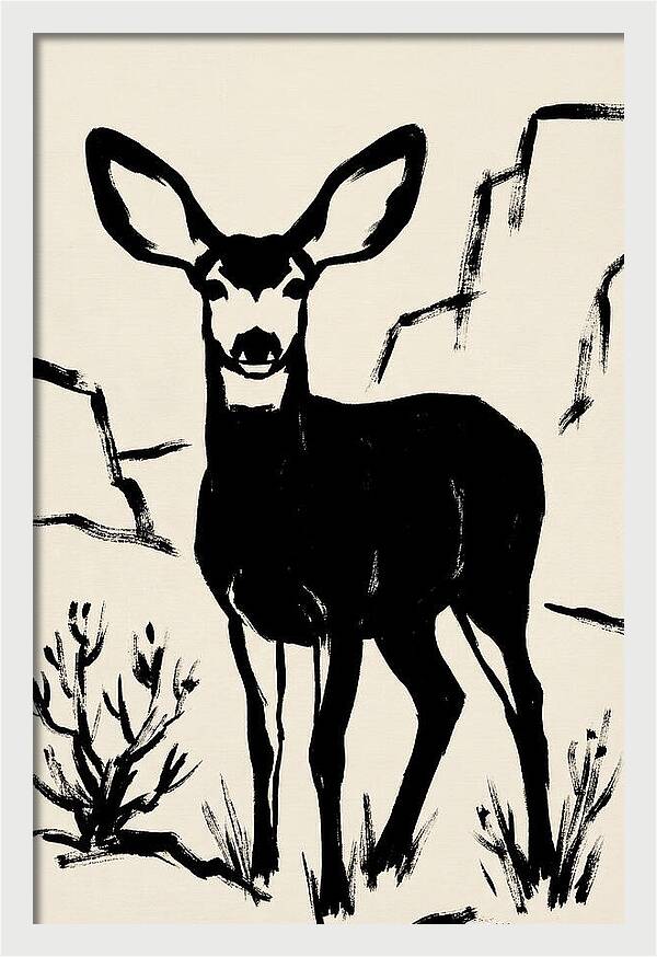 Mule Deer Silhouette Against Rocks