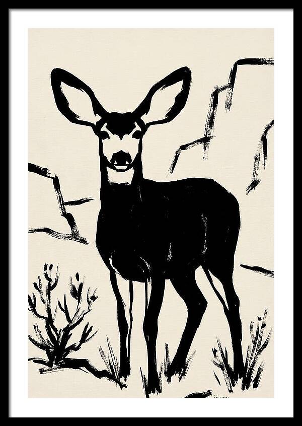 Mule Deer Silhouette Against Rocks