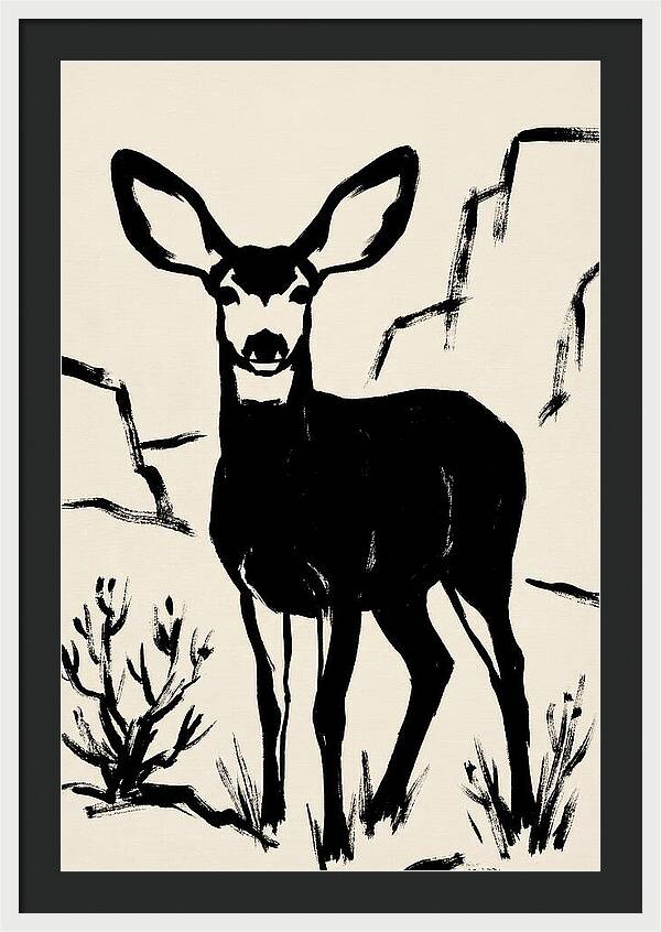 Mule Deer Silhouette Against Rocks