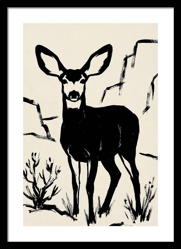 Mule Deer Silhouette Against Rocks