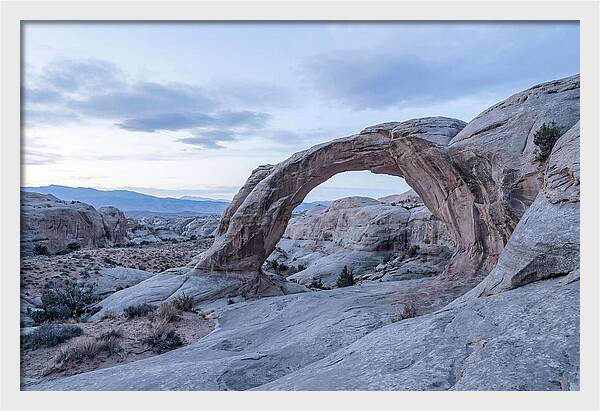 Natural Rock Bridge Over Desert