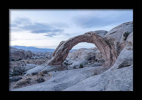 Natural Rock Bridge Over Desert