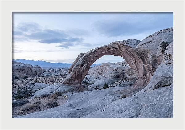 Natural Rock Bridge Over Desert