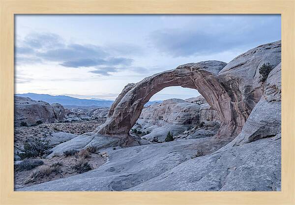 Natural Rock Bridge Over Desert