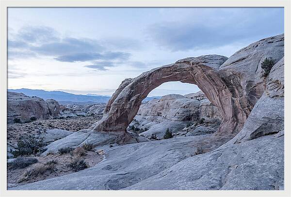 Natural Rock Bridge Over Desert