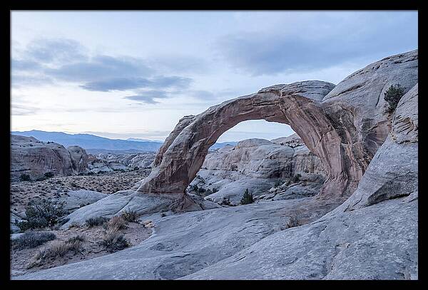 Natural Rock Bridge Over Desert