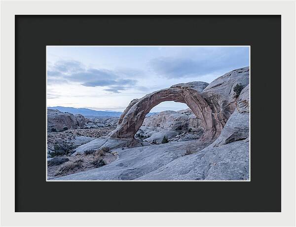 Natural Rock Bridge Over Desert