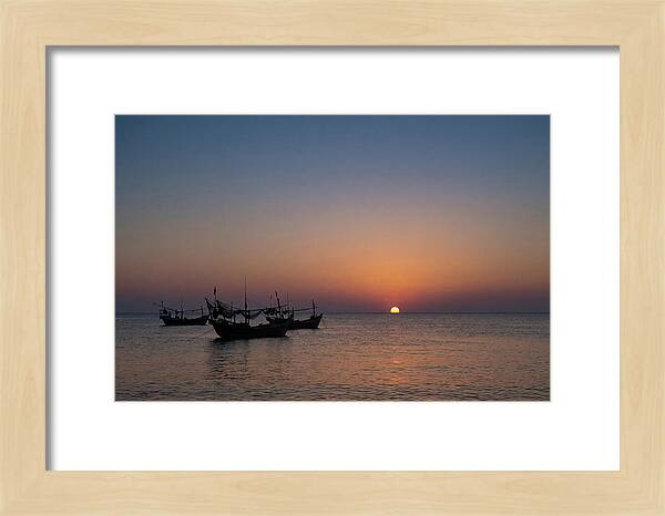 Ocean Sunset With Silhouetted Fishing Boats