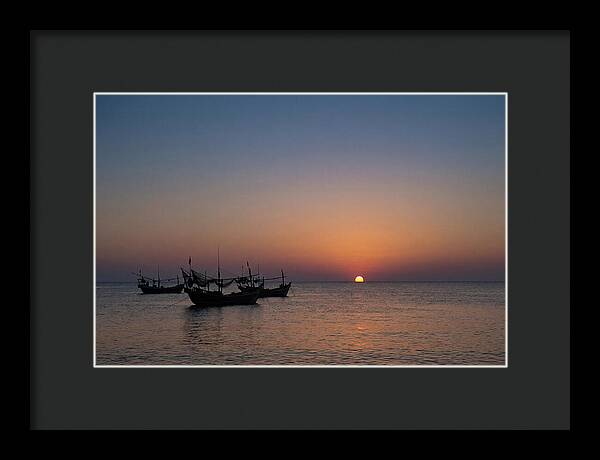 Ocean Sunset With Silhouetted Fishing Boats