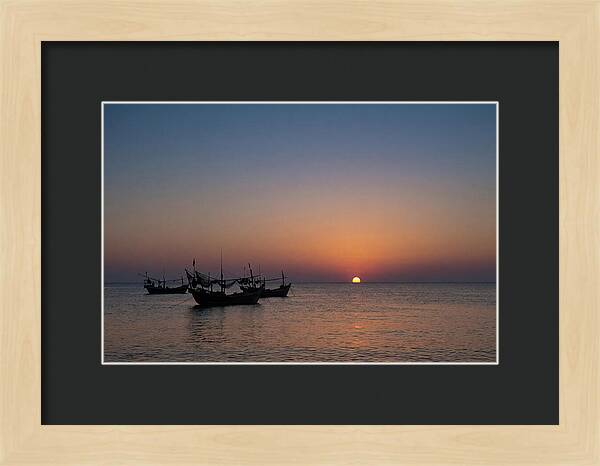 Ocean Sunset With Silhouetted Fishing Boats