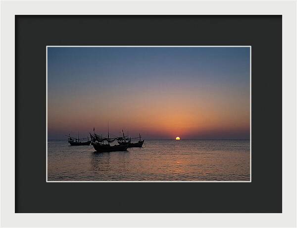Ocean Sunset With Silhouetted Fishing Boats