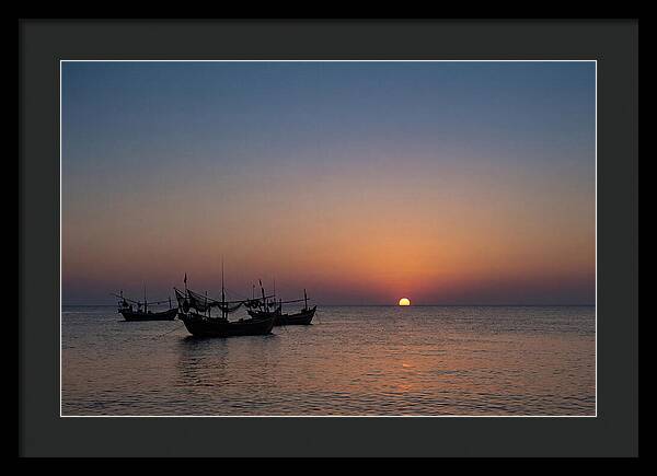 Ocean Sunset With Silhouetted Fishing Boats