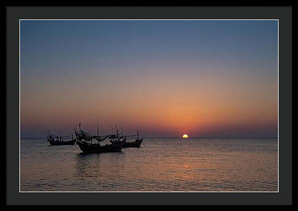 Ocean Sunset With Silhouetted Fishing Boats