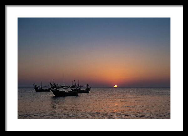 Ocean Sunset With Silhouetted Fishing Boats