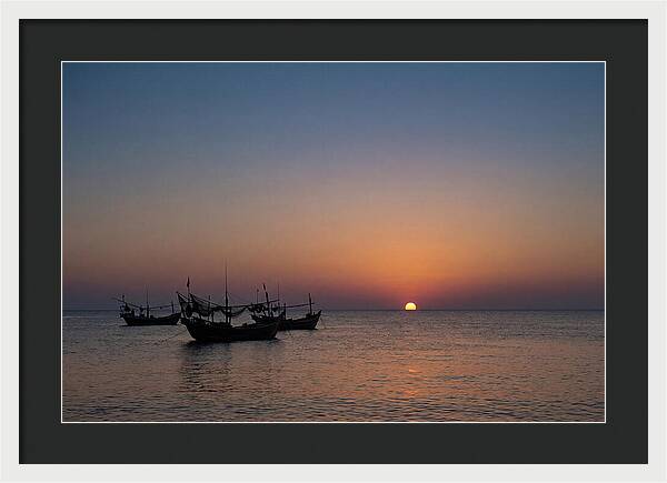 Ocean Sunset With Silhouetted Fishing Boats