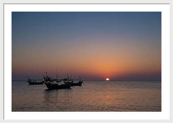 Ocean Sunset With Silhouetted Fishing Boats