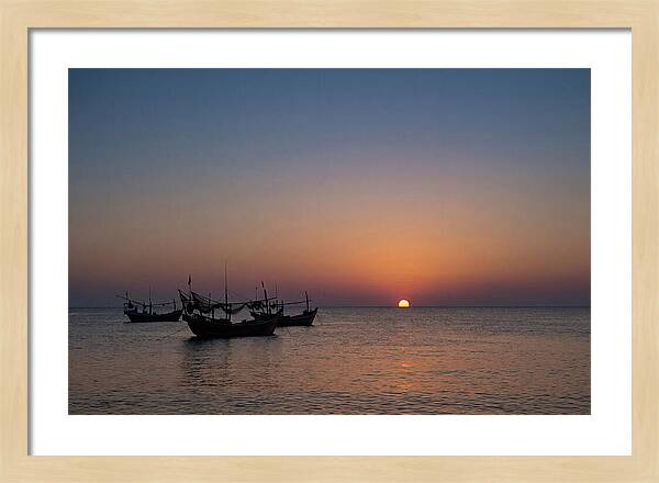 Ocean Sunset With Silhouetted Fishing Boats