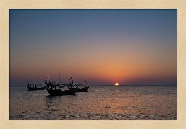 Ocean Sunset With Silhouetted Fishing Boats