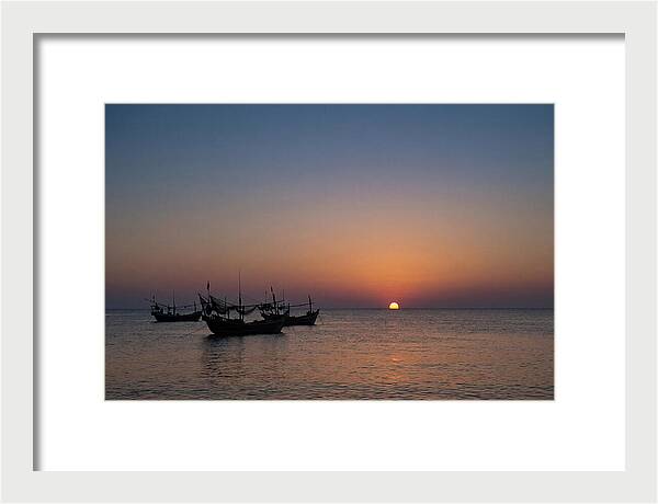 Ocean Sunset With Silhouetted Fishing Boats