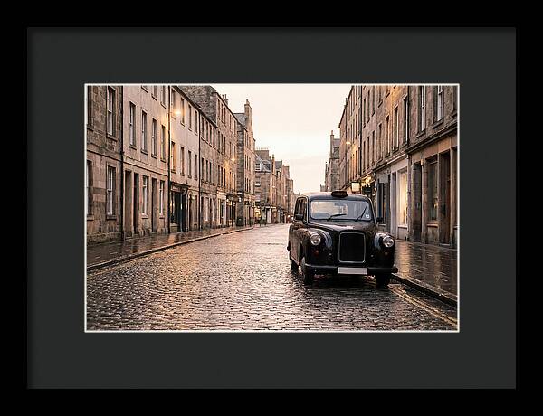 Old British Taxi Cab On Wet Street