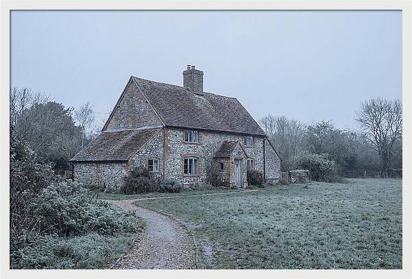 Old Cottage In Misty Landscape