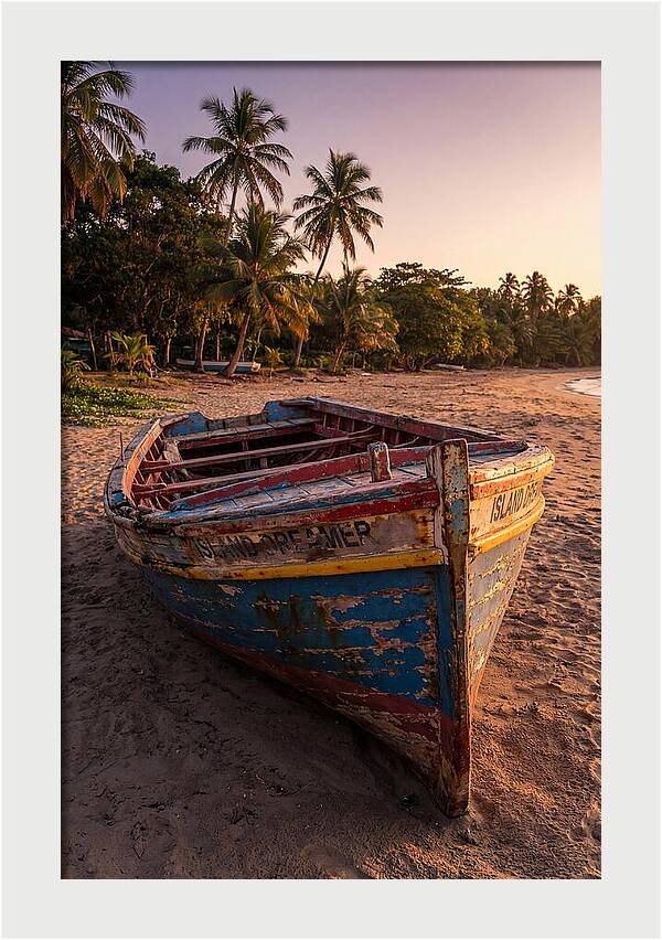 Old Fishing Boat Beached At Sunset